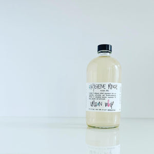 Photo of Urban Whip's Oral hygiene Rinse which is an alcohol free mouthwash on a white table with a white background 